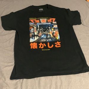 black shirt with japanese graphic and wording